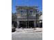 Two-story home under construction with scaffolding and a two-car garage, awaiting its final touches at 9070 Rivington Ave, Las Vegas, NV 89148