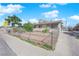 Classic single story home featuring a fenced yard and long driveway at 916 Putnam Ave, North Las Vegas, NV 89030
