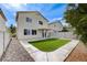 Spacious backyard with low maintenance landscaping and covered patio at 9264 Ansley Ct, Las Vegas, NV 89148