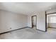 Spacious bedroom with neutral colors, carpet, and en suite bathroom at 9264 Ansley Ct, Las Vegas, NV 89148
