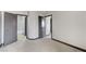 Neutral-colored bedroom has multiple entryways to ensuite bath and additional rooms at 9264 Ansley Ct, Las Vegas, NV 89148