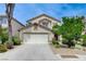 Charming two-story home with well-maintained landscaping and a two-car garage at 9264 Ansley Ct, Las Vegas, NV 89148
