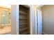 Bathroom featuring a linen closet with shelving, and neutral paint at 1931 Rose Ct, Pahrump, NV 89048