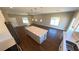 Kitchen featuring an island, stainless appliances, and hardwood floors in a well-lit open layout at 1931 Rose Ct, Pahrump, NV 89048