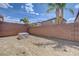 View of a backyard featuring rock landscaping and palm trees at 2641 Vendange Pl, Henderson, NV 89044