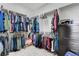 Walk-in closet with ample hanging space and built-in storage for organization at 2641 Vendange Pl, Henderson, NV 89044