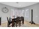 Dining area is illuminated by natural light through bay windows, showcasing tile floors at 2641 Vendange Pl, Henderson, NV 89044