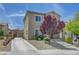 Stunning two-story home with attached garage and a lengthy driveway in a Gathering-friendly community at 2641 Vendange Pl, Henderson, NV 89044