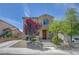 Inviting two-story home featuring well-maintained landscaping and a charming front entrance at 2641 Vendange Pl, Henderson, NV 89044