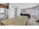 Bright kitchen boasts granite countertops, stainless steel appliances, and tile flooring at 2641 Vendange Pl, Henderson, NV 89044