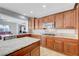 Open concept kitchen featuring an island and stainless steel appliances with lots of cabinet space at 2641 Vendange Pl, Henderson, NV 89044