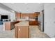 Modern kitchen with an island, stainless steel appliances, granite countertops and ample cabinetry at 2641 Vendange Pl, Henderson, NV 89044