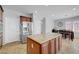 Kitchen featuring a granite island, stainless steel appliances, and ample storage at 2641 Vendange Pl, Henderson, NV 89044