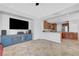 The living room has tile flooring and a TV console at 2641 Vendange Pl, Henderson, NV 89044