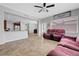 Open living room features tile flooring that connects to the kitchen and plenty of space at 2641 Vendange Pl, Henderson, NV 89044
