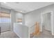 Upper loft area with neutral tones, a window, carpet flooring, and natural light at 2641 Vendange Pl, Henderson, NV 89044