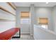Cozy loft area with natural light, shelving, and room for a desk or seating at 2641 Vendange Pl, Henderson, NV 89044