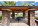 Stone-columned pavilion with seating, in a well-maintained community park at 2641 Vendange Pl, Henderson, NV 89044