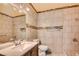 This bathroom has stylish modern tilework, updated fixtures, and a large mirror at 3254 Greenbriar Dr, Las Vegas, NV 89121