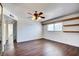 This bedroom features natural lighting, modern wood floors, shelving, and a closet at 3254 Greenbriar Dr, Las Vegas, NV 89121