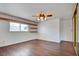 The bedroom features modern floors, bright natural light, and a large closet with mirrored doors at 3254 Greenbriar Dr, Las Vegas, NV 89121