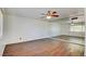 Spacious bedroom featuring hardwood floors and a mirrored wall at 3254 Greenbriar Dr, Las Vegas, NV 89121