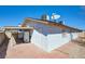 Rear exterior view with brick paved patio and access to the covered area at 3254 Greenbriar Dr, Las Vegas, NV 89121