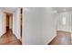 Entry hallway featuring hardwood floors and white doors at 3254 Greenbriar Dr, Las Vegas, NV 89121
