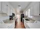 Bright kitchen with stainless steel appliances, granite countertops, wooden floors, and ample storage at 3254 Greenbriar Dr, Las Vegas, NV 89121