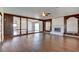 Hardwood floors accent this spacious living room with a fireplace at 3254 Greenbriar Dr, Las Vegas, NV 89121