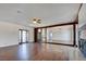Bright living room with hardwood floors, a ceiling fan, and a fireplace at 3254 Greenbriar Dr, Las Vegas, NV 89121
