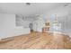 Bright living room with wood floors, high ceilings, and arched doorways for open and airy living space at 3581 Pahrump Valley Blvd, Pahrump, NV 89048