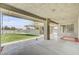 Covered patio area perfect for outdoor dining and entertaining with access to a well-maintained backyard at 3581 Pahrump Valley Blvd, Pahrump, NV 89048