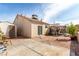 Spacious backyard with a patio, shed, desert landscaping, and shade structure at 436 Pumpkin Way, Henderson, NV 89015