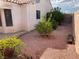 Low maintenance backyard with greenery and gravel at 436 Pumpkin Way, Henderson, NV 89015