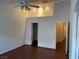 Bedroom features neutral walls, a ceiling fan, and closet and bathroom entrances at 436 Pumpkin Way, Henderson, NV 89015