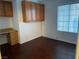 Bedroom featuring laminate wood floors, natural light and desk with storage at 436 Pumpkin Way, Henderson, NV 89015
