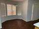 Dining room with wood floors, bright natural light and slider doors at 436 Pumpkin Way, Henderson, NV 89015