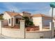 Charming stucco home with terracotta roof, desert landscaping and a two-car garage at 436 Pumpkin Way, Henderson, NV 89015