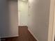 Hallway with laminate floor and access to another room at 436 Pumpkin Way, Henderson, NV 89015