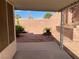 Covered patio with gravel yard and brick walls at 436 Pumpkin Way, Henderson, NV 89015