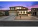 Charming two-story home with a desert landscape, neutral color palette, and a barrel tile roof at 489 Wendover Hills Ave, Las Vegas, NV 89123