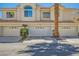 Townhome with attached garages and desert landscaping at 5412 Harmony Green Dr # 101, Las Vegas, NV 89149