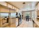 Stylish kitchen with stainless steel appliances and a breakfast nook provides convenience and charm at 5412 Harmony Green Dr # 101, Las Vegas, NV 89149