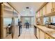 Spacious kitchen features stainless appliances, granite counters, and a functional layout at 5412 Harmony Green Dr # 101, Las Vegas, NV 89149