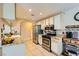 Updated kitchen features stainless steel appliances and granite counters, great for home chefs at 5412 Harmony Green Dr # 101, Las Vegas, NV 89149