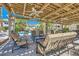Relaxing outdoor pool with lounge area, offering a refreshing escape in a tranquil setting under a covered pergola at 5412 Harmony Green Dr # 101, Las Vegas, NV 89149