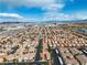 A broad aerial view of the Las Vegas community with the local commercial developments in the distance at 6790 Gold Yarrow St, Las Vegas, NV 89148
