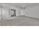 Spacious main bedroom features neutral carpeting and adjoins the bathroom and a walk-in closet at 6790 Gold Yarrow St, Las Vegas, NV 89148