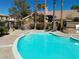 Community swimming pool featuring clear water and surrounding lounge area at 6790 Gold Yarrow St, Las Vegas, NV 89148